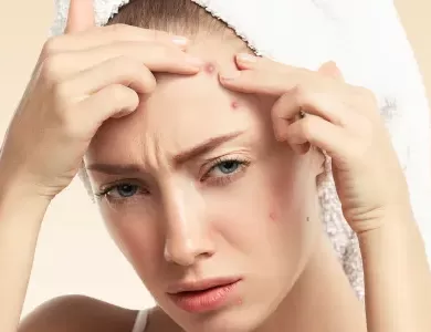 forehead pimples reason​